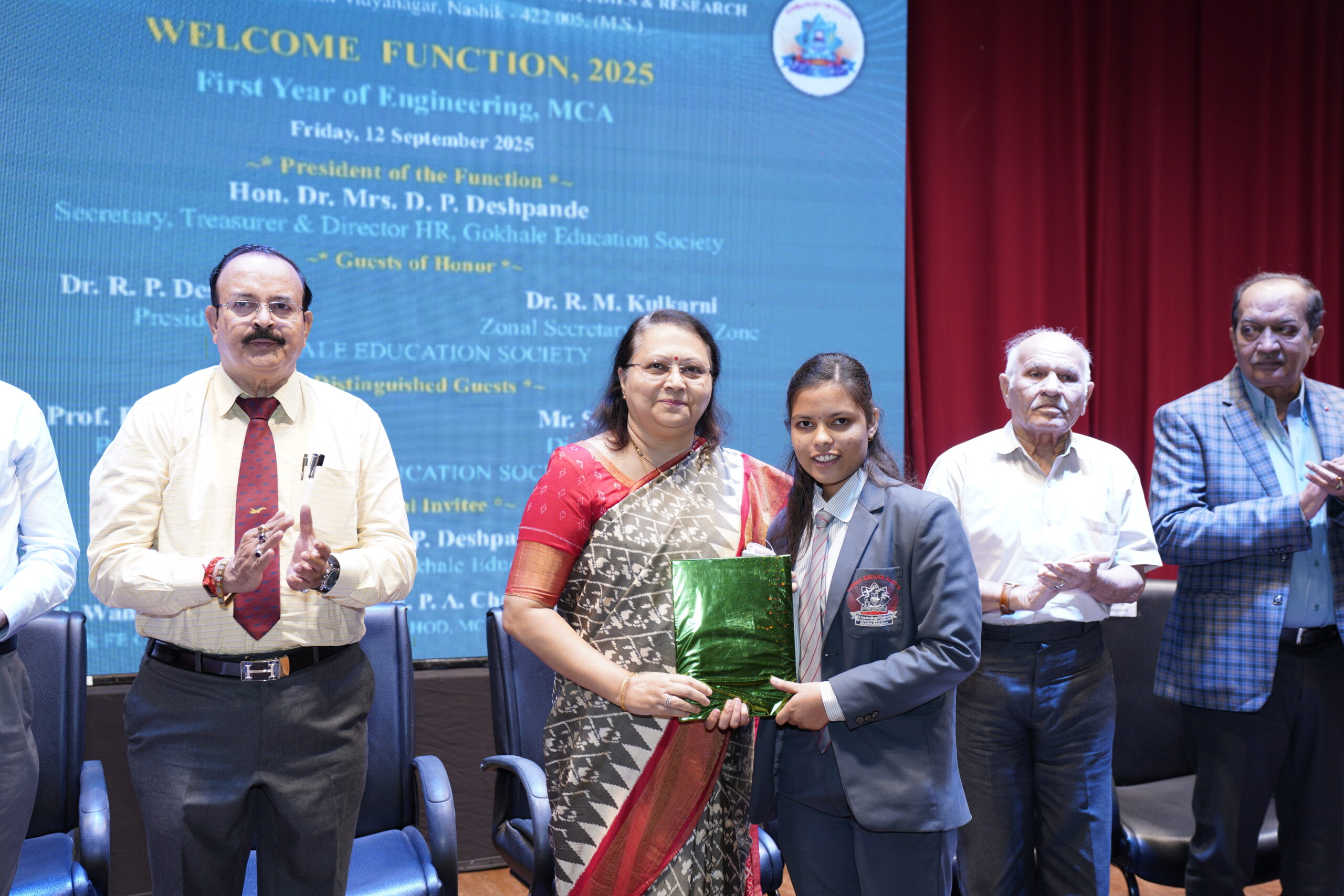 Felicitation of F. E. Toppers  by Chief guest Dr. Mrs. Deepti P. Deshpande, Secretary, Gokhale Education Society, Nashik